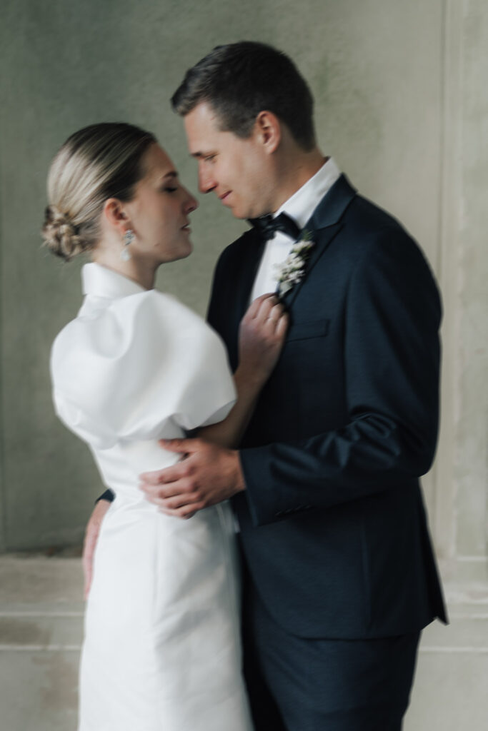 Candid moment of the groom looking at his bride, photographed by Maria Bruckmaier Wedding Photography.